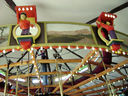 Rounding Board with Children Shields and Center Pole Girl